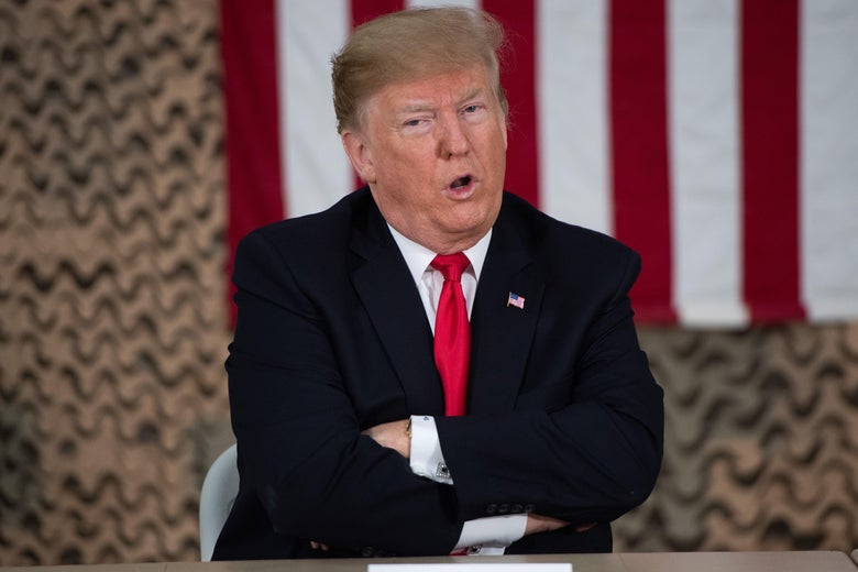 President Donald Trump speaks at a military briefing during an unannounced trip to Al Asad Air Base in Iraq on December 26, 2018.